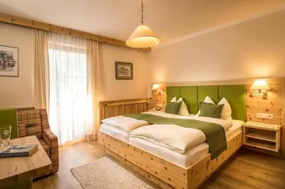 Ein Bett oder Betten in einem Zimmer der Unterkunft Gasthof Murtalerhof