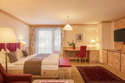 Ein Bett oder Betten in einem Zimmer der Unterkunft Gasthof Murtalerhof