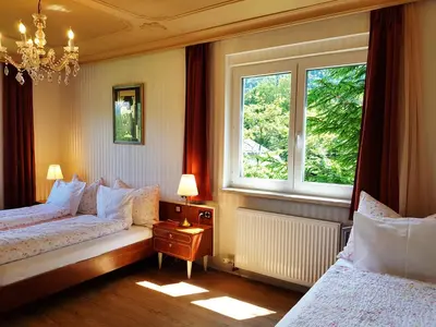 Ein Bett oder Betten in einem Zimmer der Unterkunft Aparthotel Pan Haus