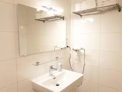 Ein Badezimmer in der Unterkunft Aparthotel Pan Haus