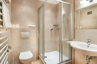 Ein Badezimmer in der Unterkunft Hotel Stockerwirt