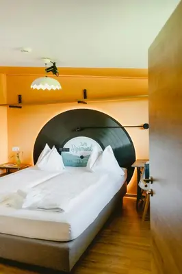 Ein Bett oder Betten in einem Zimmer der Unterkunft zum Sigismund - kiss & sleep