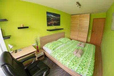 Ein Bett oder Betten in einem Zimmer der Unterkunft Powderia Family & Freelance Apartment in the centre of Ski Amadé