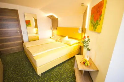 Ein Bett oder Betten in einem Zimmer der Unterkunft Gästehaus Stabauer