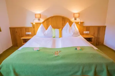 Ein Bett oder Betten in einem Zimmer der Unterkunft Forsterhof
