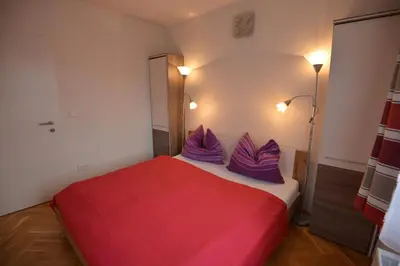 Ein Bett oder Betten in einem Zimmer der Unterkunft PirkerHof
