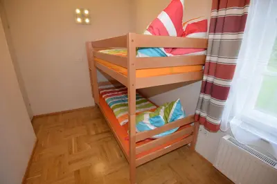 Ein Bett oder Betten in einem Zimmer der Unterkunft PirkerHof