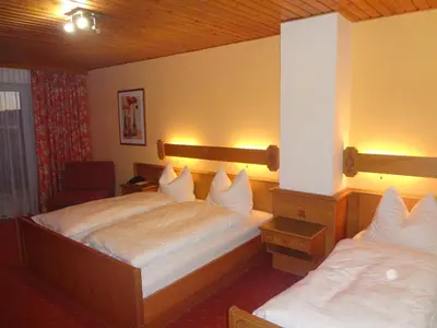 Ein Bett oder Betten in einem Zimmer der Unterkunft Gasthofladen Schneeweiss