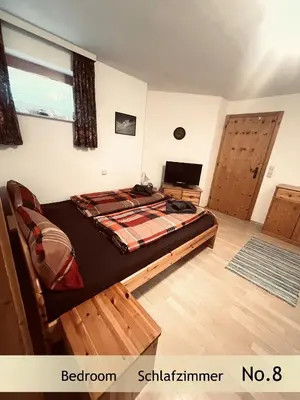 Ein Bett oder Betten in einem Zimmer der Unterkunft Gerhards Landhaus