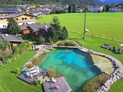Der Swimmingpool an oder in der Nähe von almlust - hotel, apartments, chalets