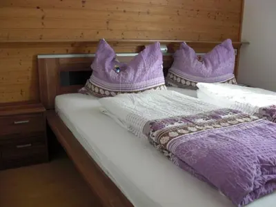 Ein Bett oder Betten in einem Zimmer der Unterkunft Ferienhaus Reschreiter