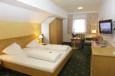 Ein Bett oder Betten in einem Zimmer der Unterkunft Hotel Stegmühlhof