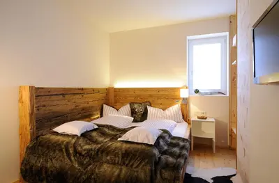 Ein Bett oder Betten in einem Zimmer der Unterkunft Luxuslodge - Zeit zum Leben
