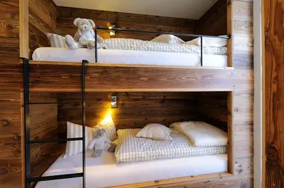 Ein Bett oder Betten in einem Zimmer der Unterkunft Luxuslodge - Zeit zum Leben
