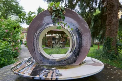 Ein Garten an der Unterkunft Hametner mit Innviertlerhaus mit Thermenzugang