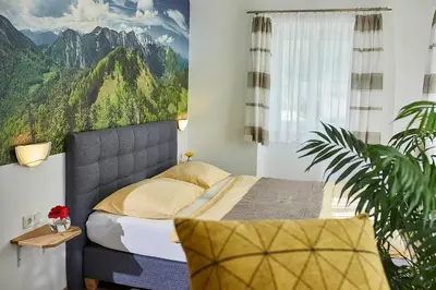 Ein Bett oder Betten in einem Zimmer der Unterkunft Landgasthof Klausner