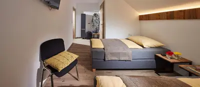 Ein Bett oder Betten in einem Zimmer der Unterkunft Landgasthof Klausner