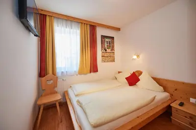 Ein Bett oder Betten in einem Zimmer der Unterkunft Happy Flachau
