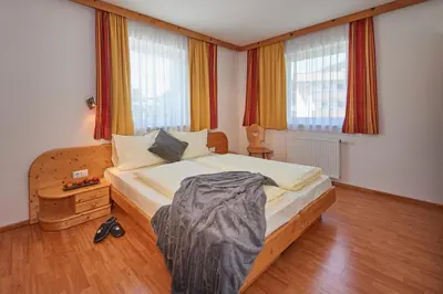 Ein Bett oder Betten in einem Zimmer der Unterkunft Happy Flachau