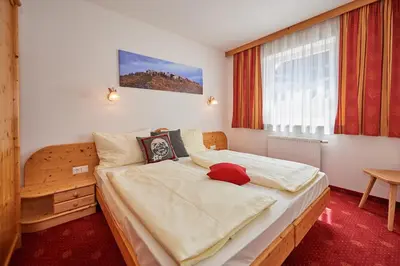 Ein Bett oder Betten in einem Zimmer der Unterkunft Happy Flachau