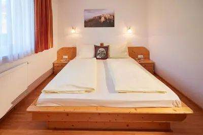 Ein Bett oder Betten in einem Zimmer der Unterkunft Happy Flachau