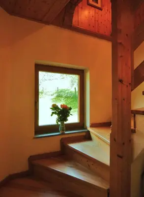 Ein Bett oder Betten in einem Zimmer der Unterkunft Kleines Ferienhaus Koglerhütte