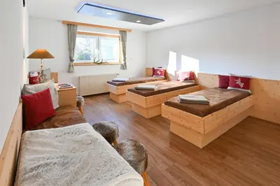 Ein Bett oder Betten in einem Zimmer der Unterkunft Hotel Sonnfeld