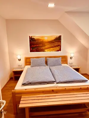 Ein Bett oder Betten in einem Zimmer der Unterkunft Ferienhof Hintergrabenbauer
