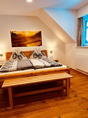 Ein Bett oder Betten in einem Zimmer der Unterkunft Ferienhof Hintergrabenbauer