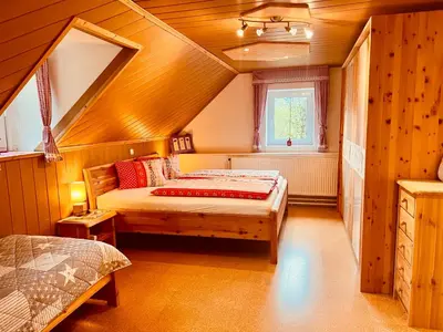 Ein Bett oder Betten in einem Zimmer der Unterkunft Ferienhof Hintergrabenbauer