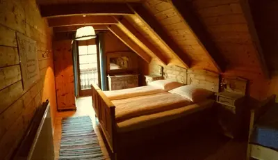 Ein Bett oder Betten in einem Zimmer der Unterkunft Ferienhaus Gobald