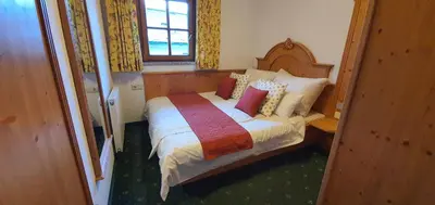 Ein Bett oder Betten in einem Zimmer der Unterkunft Schlosserhaus Appartements