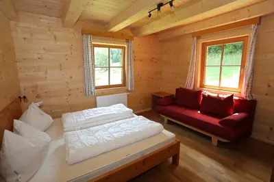Ein Bett oder Betten in einem Zimmer der Unterkunft Hüttendorf Schladming
