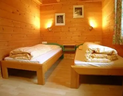 Ein Bett oder Betten in einem Zimmer der Unterkunft Appartement Ramsau, Haus Fichte