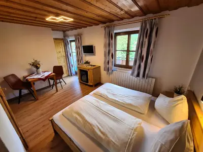Ein Bett oder Betten in einem Zimmer der Unterkunft Pension Sydler