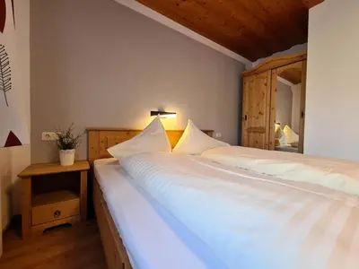 Ein Bett oder Betten in einem Zimmer der Unterkunft Pension Sydler