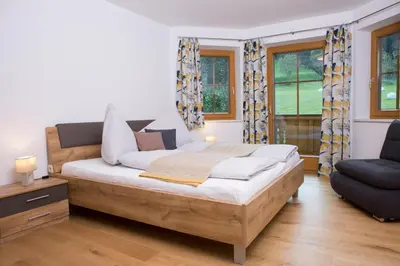 Ein Bett oder Betten in einem Zimmer der Unterkunft Oberschartlhof