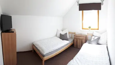 Ein Bett oder Betten in einem Zimmer der Unterkunft Vordermuhr 34