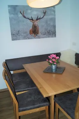 Ein Sitzbereich in der Unterkunft Sieglhub Chalets - Appartements - Hotel