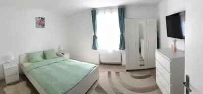 Ein Bett oder Betten in einem Zimmer der Unterkunft Luxury Apartment