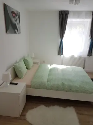 Ein Bett oder Betten in einem Zimmer der Unterkunft Luxury Apartment