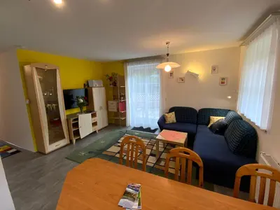 Ein Sitzbereich in der Unterkunft Ferienwohnung Holiday