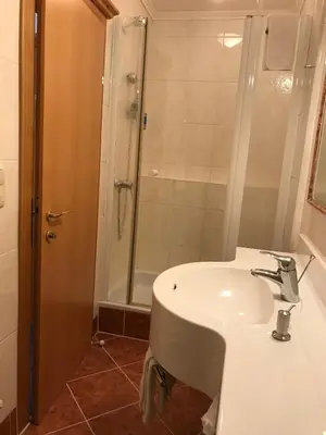 Ein Badezimmer in der Unterkunft Hotel-Pension Wagnermigl