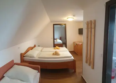 Ein Bett oder Betten in einem Zimmer der Unterkunft Pension Pürcherhof