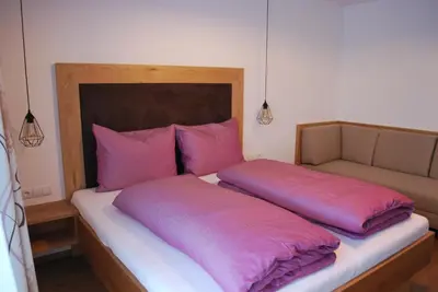 Ein Bett oder Betten in einem Zimmer der Unterkunft Die Atempause - appartements