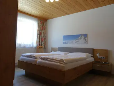 Ein Bett oder Betten in einem Zimmer der Unterkunft Aparthaus Birkenheim