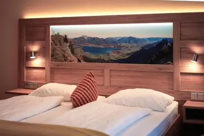 Ein Bett oder Betten in einem Zimmer der Unterkunft Hotel Garni Pension zur Wacht