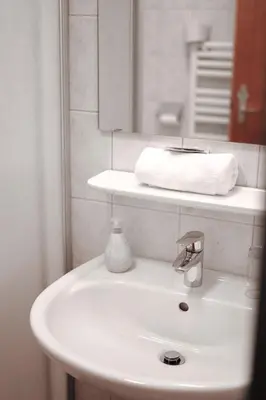 Ein Badezimmer in der Unterkunft Hotel Garni Pension zur Wacht
