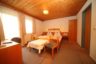 Ein Bett oder Betten in einem Zimmer der Unterkunft Hotel-Café Perner