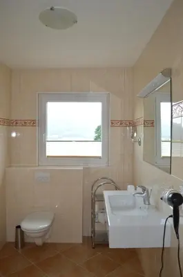 Ein Badezimmer in der Unterkunft Pension Waldheim